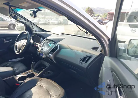 2013 Hyundai Tucson Limited z USA, uszkodzony, nr VIN KM8JU3AC2DU599190